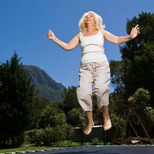 woman jumping on trampoline