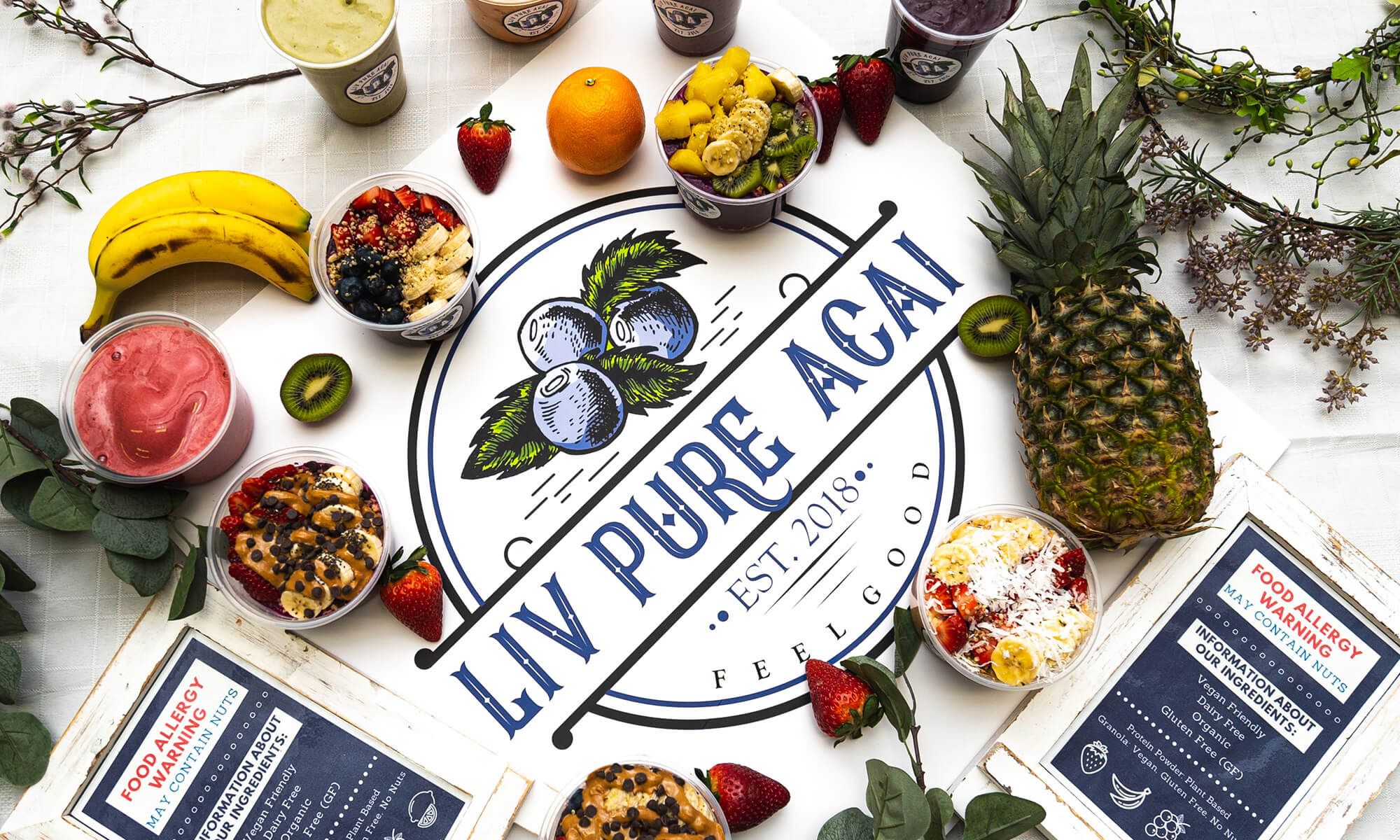 liv pure acai fruit  and logo spread