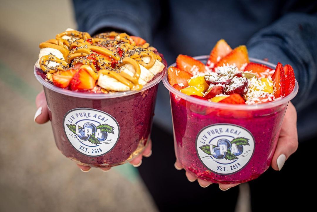 two acai bowls with toppings