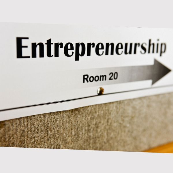White wayfinding sign A Guide to Elevating Customer Journeys with Custom Wayfinding Signs-4.jpg