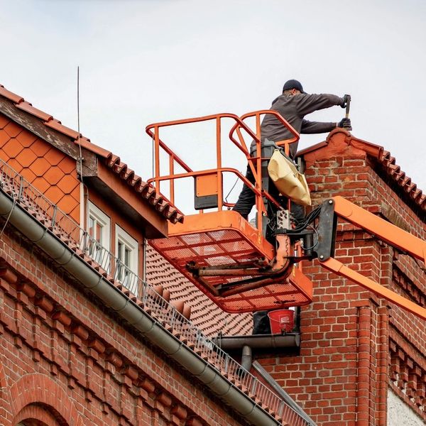 roofer working on roof