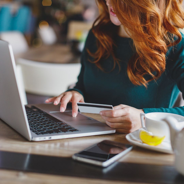 image of a woman paying a bill image of a woman paying a bill