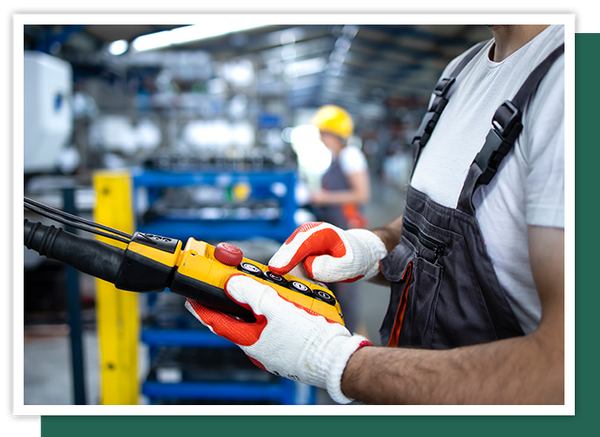 Image of a factory worker working