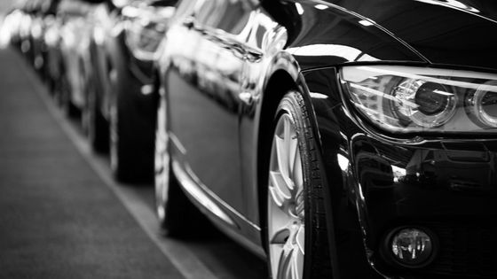 parked cars in a line along the street