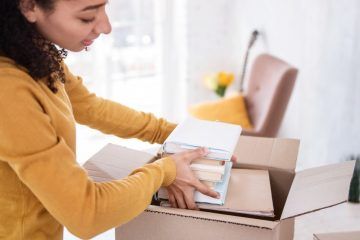 Woman Packing Up Box