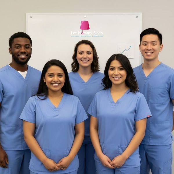 A diverse group of four professional caregivers (Night Nannies and Doulas) wearing light blue scrubs and standing together, smiling confidently, representing certified, trusted care
