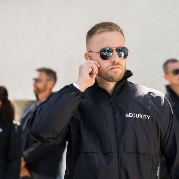 security guard using an ear piece
