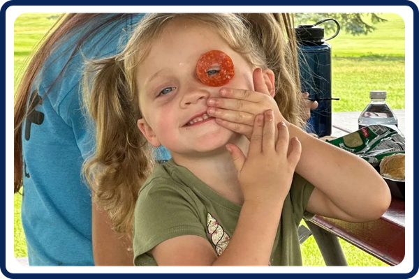 little girl with food on her face