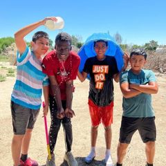 youth playing with water