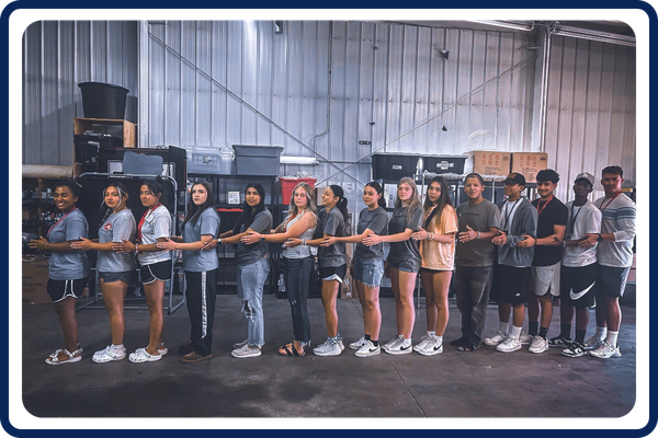 students standing in a row