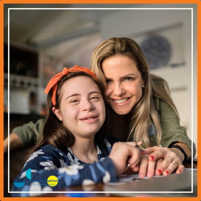 disabled person learning at home with a parent