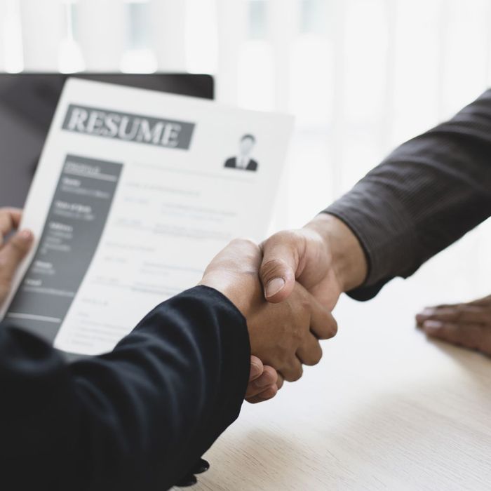 Handshake between employer and employee. Handshake between employer and employee.