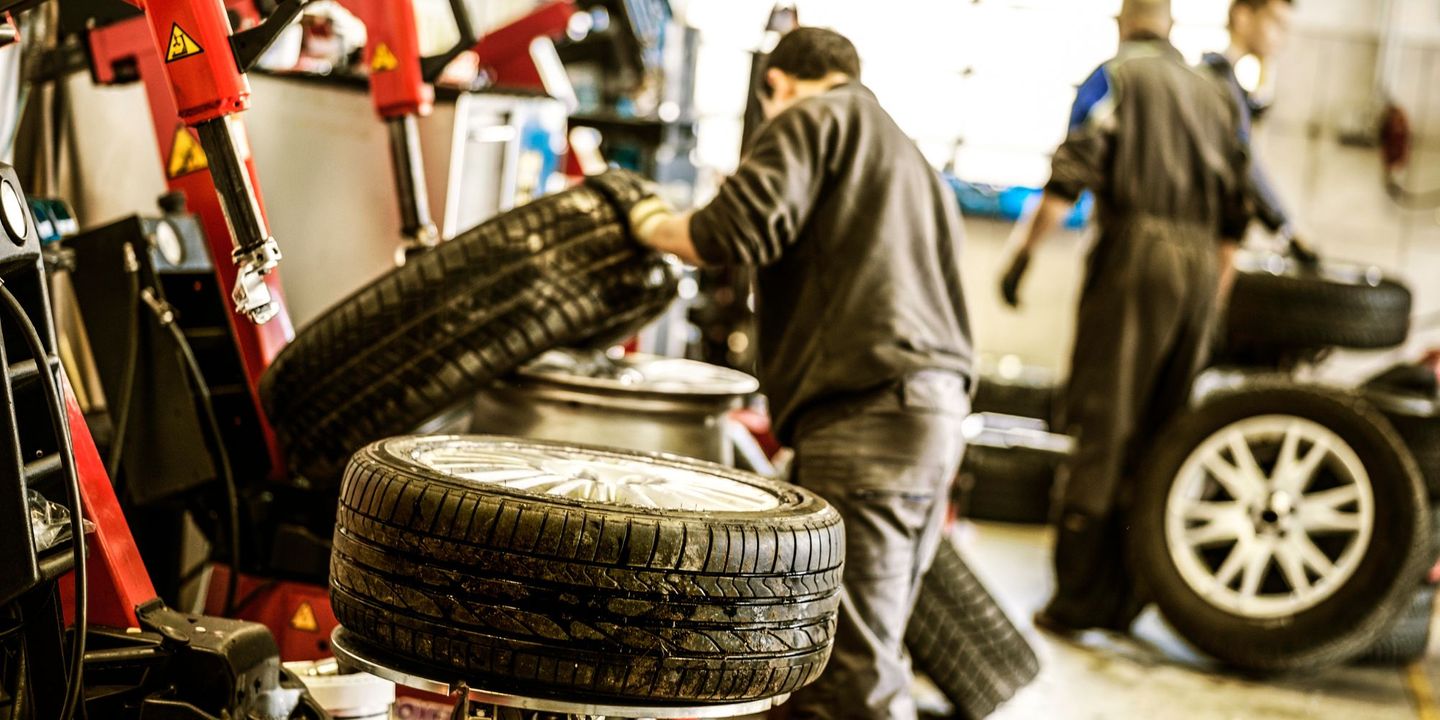 staff working in auto body shop