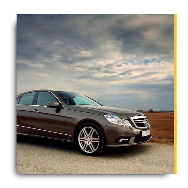 luxury car parked on road