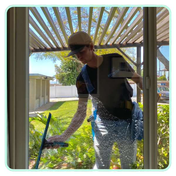 guy washing window