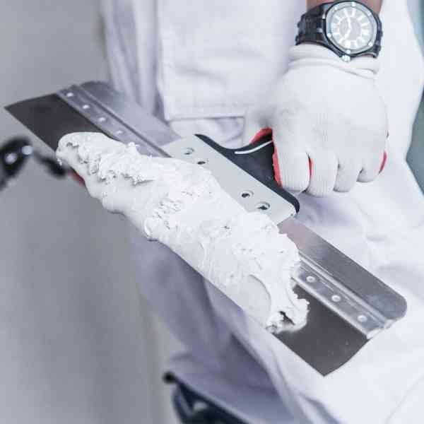 knife and mud for drywall repair after a leak