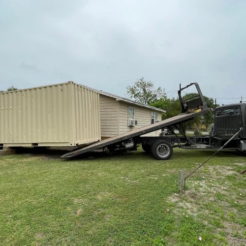 storage container getting dropped off