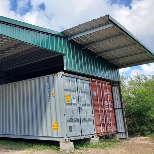 two storage containers under mental bulding