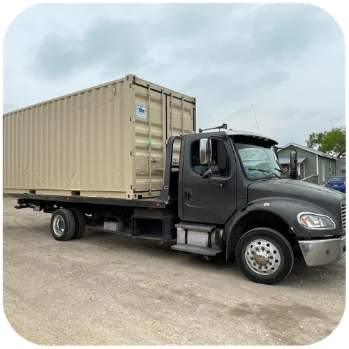 truck moving a storage container 