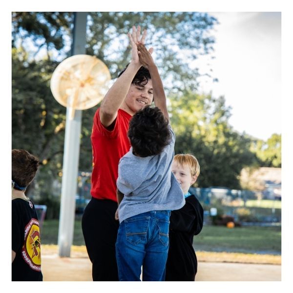 high fiving karate instructor