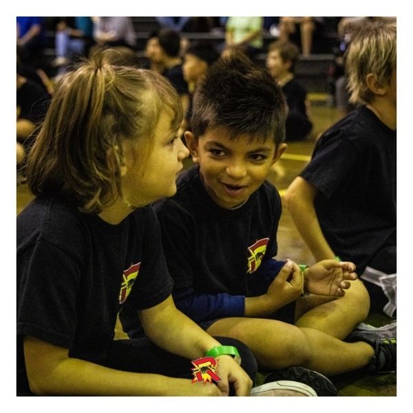 children sitting together on the floor