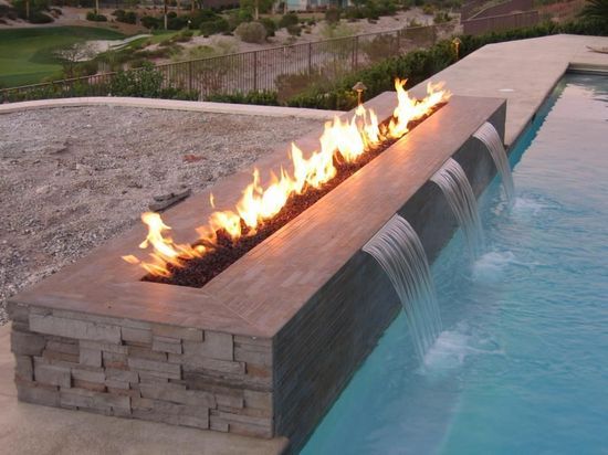 fire feature and waterfall by pool