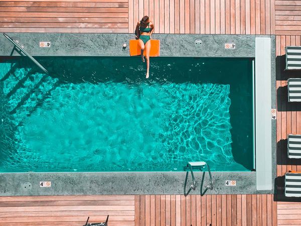 aerial view of woman at a pool