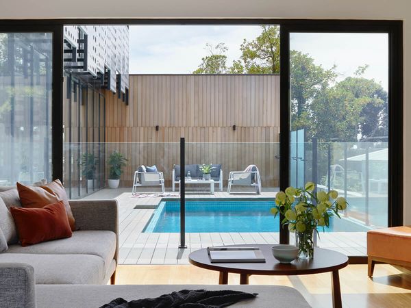view of backyard pool in modern home view of backyard pool in modern home