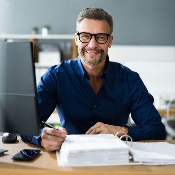 business man smiling at camera