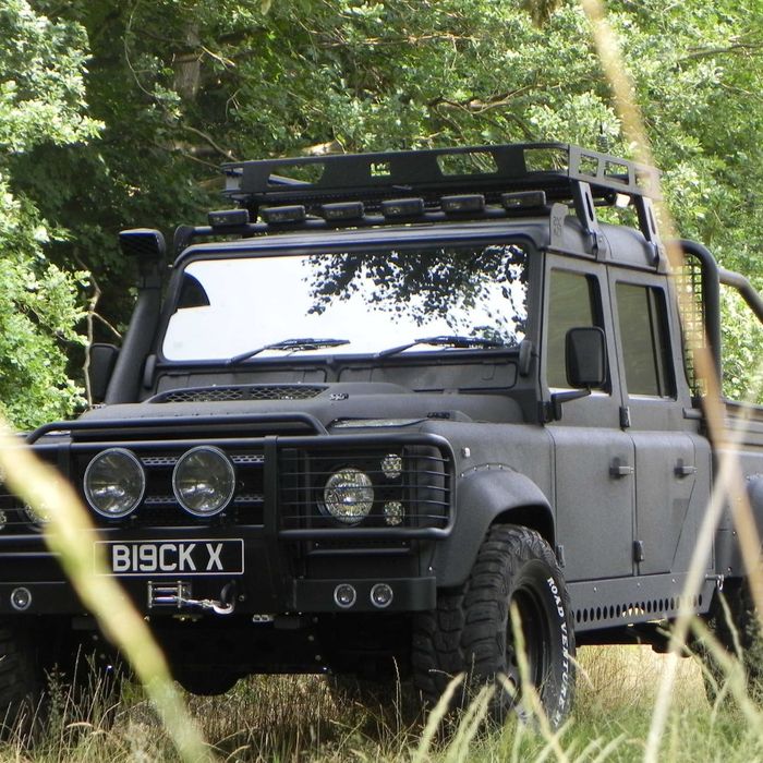 a grey off-roading vehicle coated in a matte protective paint