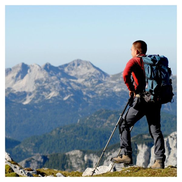 person hiking in mountains