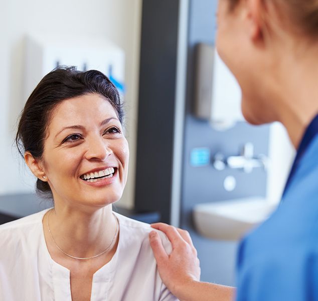 Image of a doctor talking to a patient