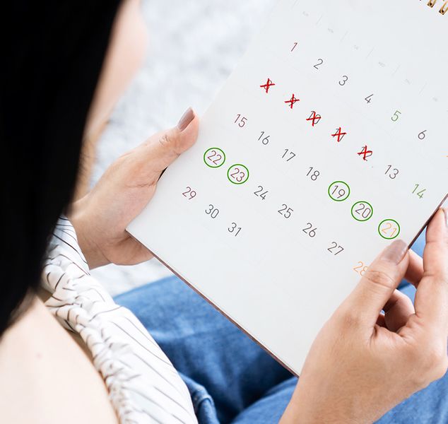 Image of a woman with a calendar