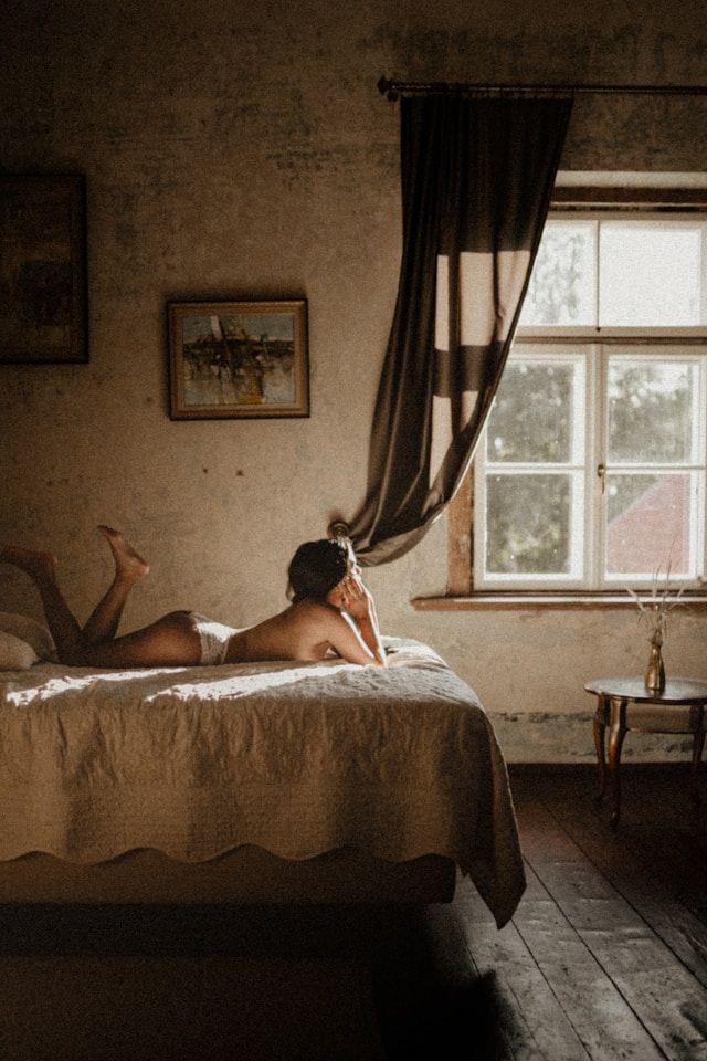Girl on Bed Small .jpg
