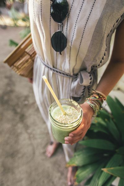 girl in cute outfit with smoothie.jpg