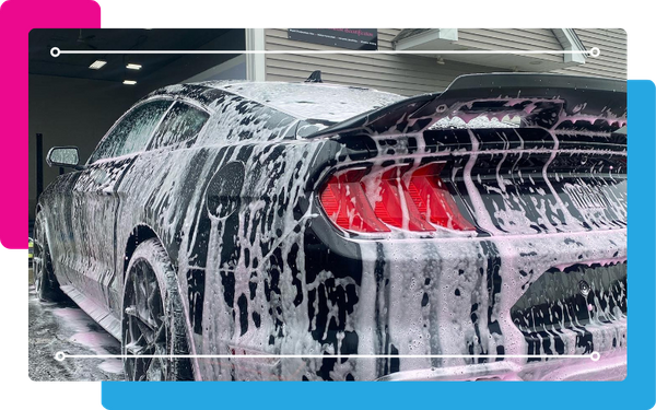 car getting washed before detailing