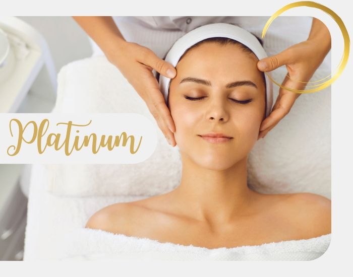 Platinum Hydrafacial with a smiling woman