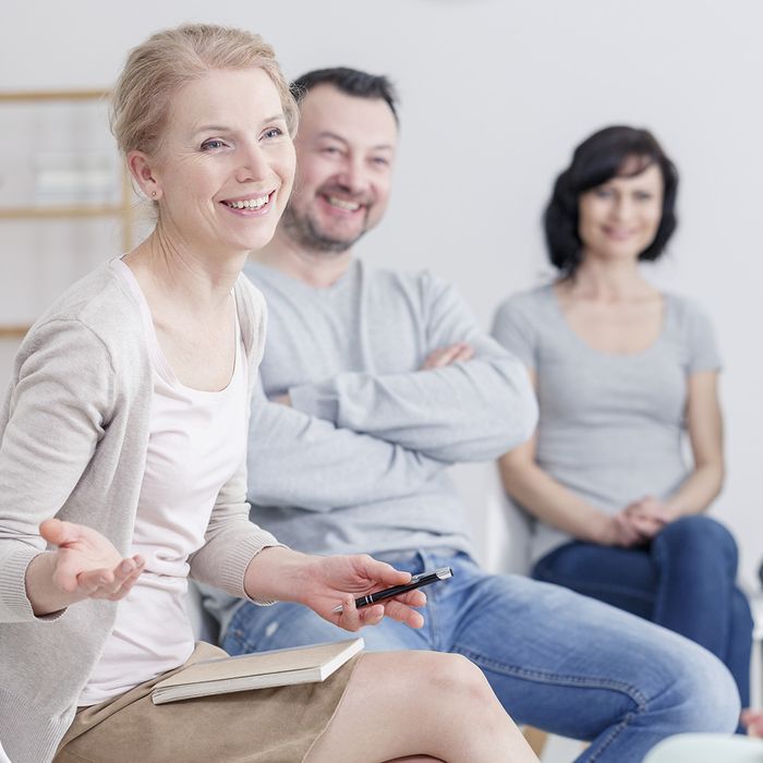 Diverse group collaborating in a modern, light-filled office space people.jpg