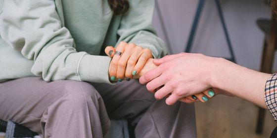 holding hands to comfort