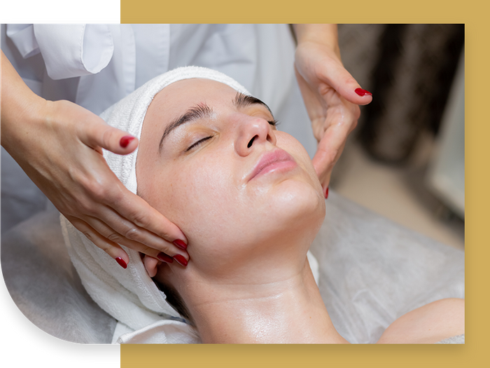 image of a woman getting a facial