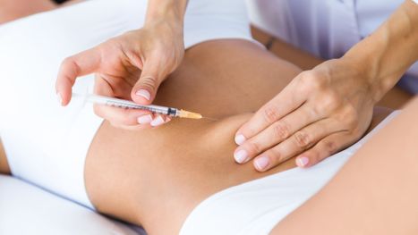woman getting weight loss injection