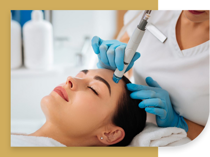 image of a woman getting a facial