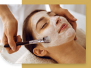 image of a woman getting a facial