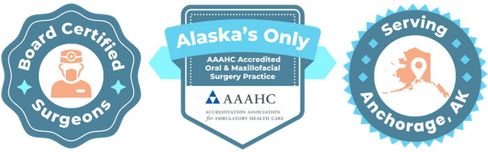 badges: board certified surgeons, alaska's only aaahc accredited oral & maxillofacial surgery practice, serving anchorage, AK
