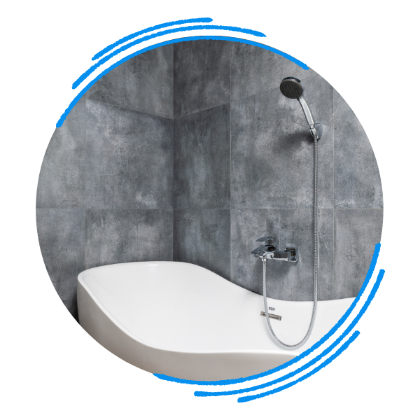 Luxury tub with shower spout on wall behind it