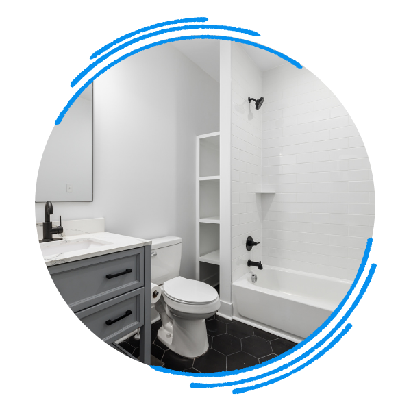 A nicely remodeled bathroom with a bath shower combo