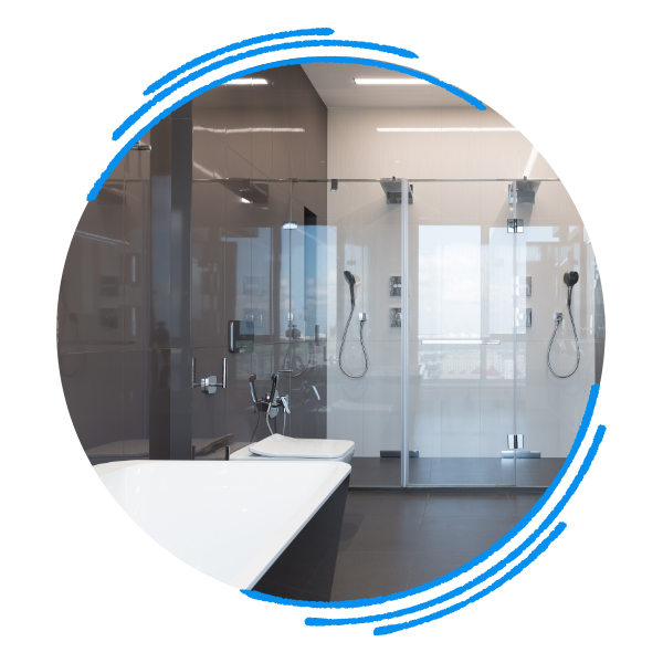 Sleek, modern double-wide shower with glass doors and a bathtub in the foreground