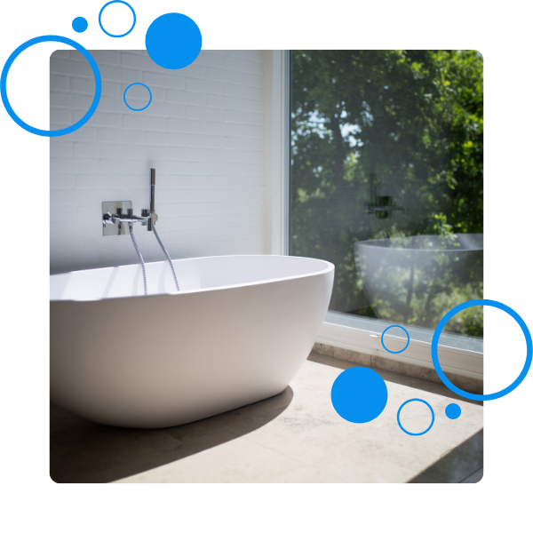 Luxury bathtub next to large window