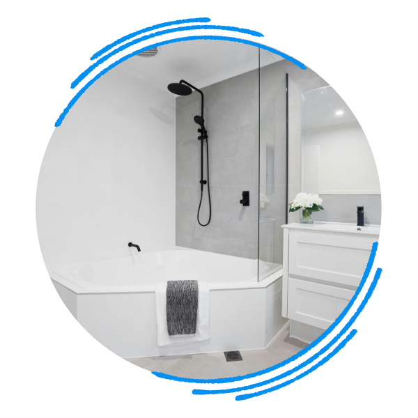 A five-sided luxury bathtub with an overhead shower head