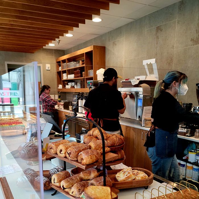 inside of the cafe with busy workers